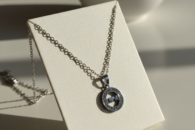 Silver chain with Love pendant