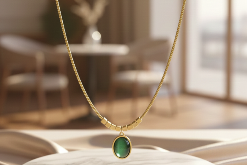Chain with green stone pendant