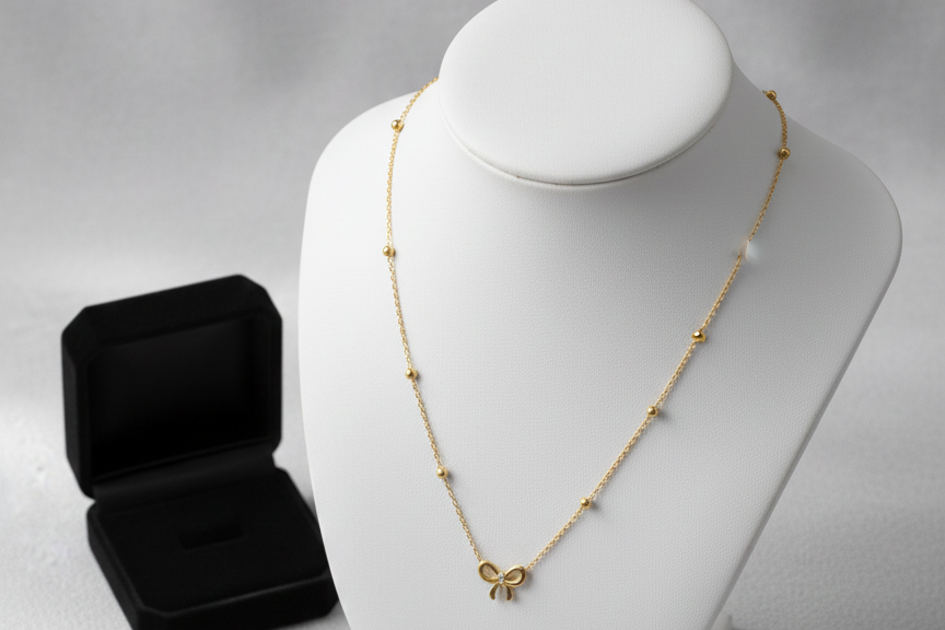 Chain with  bow pendant